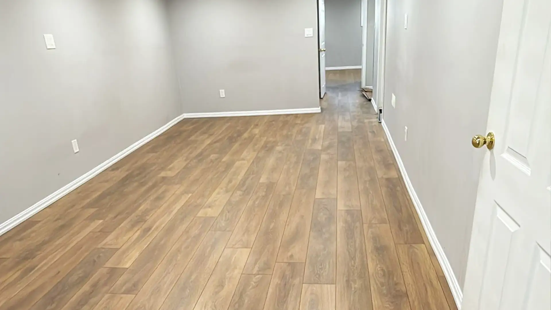 Durable Laminate Flooring Installation for a Family Home in Kitchener by Petun Flooring