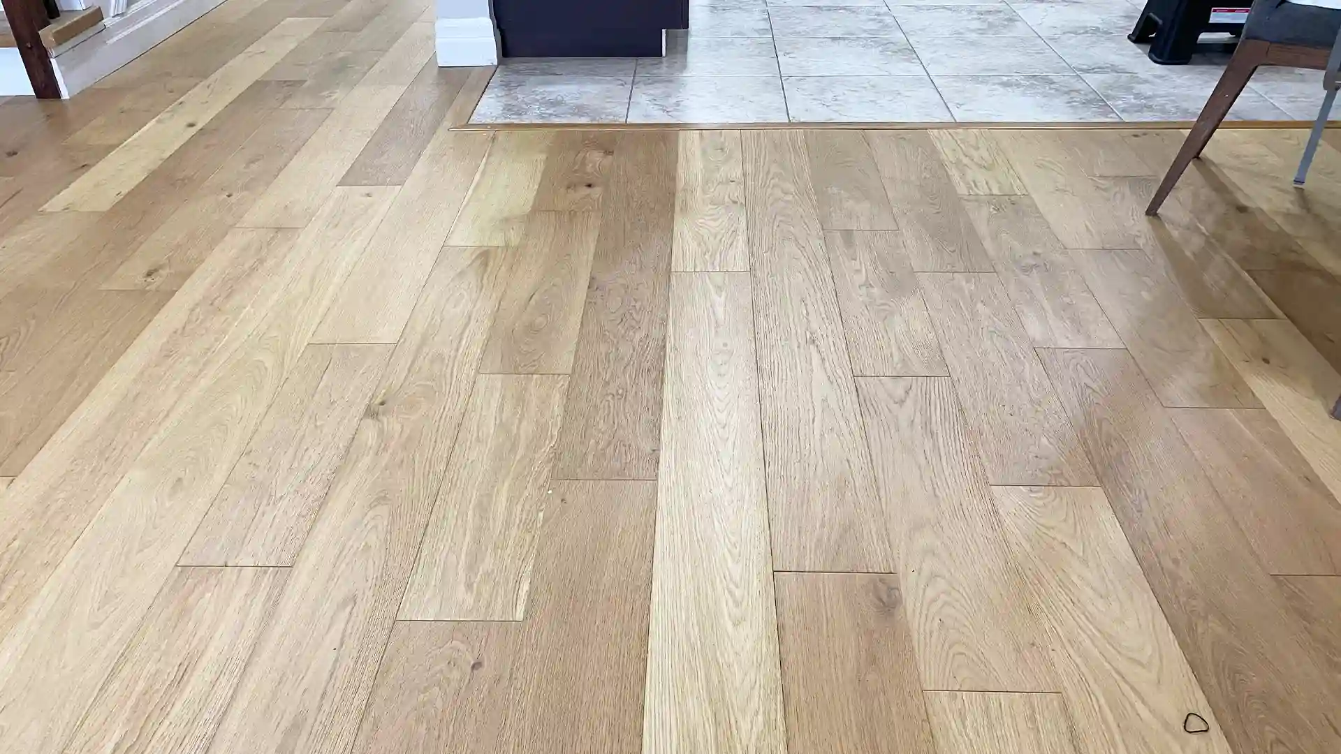 Laminate Flooring and Hardwood Stair Installation in a Residential Home by Petun Flooring