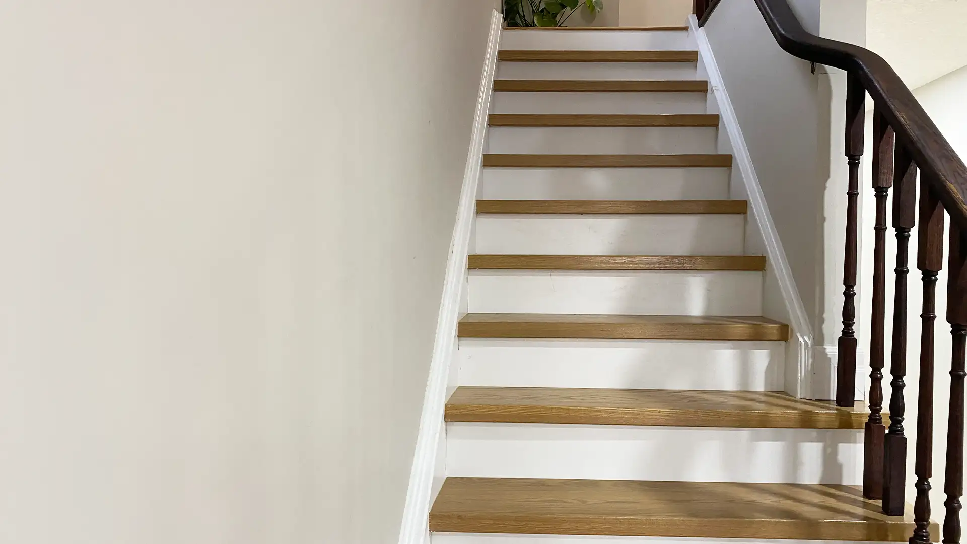 Modern Laminate Floors and Elegant Hardwood Staircase Upgrade by Petun Flooring