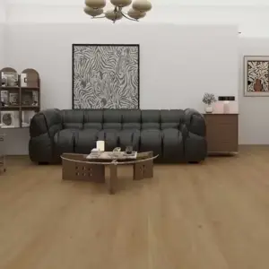 Woden 1004 River Clay SPC vinyl plank floor in a living room with a dark sofa